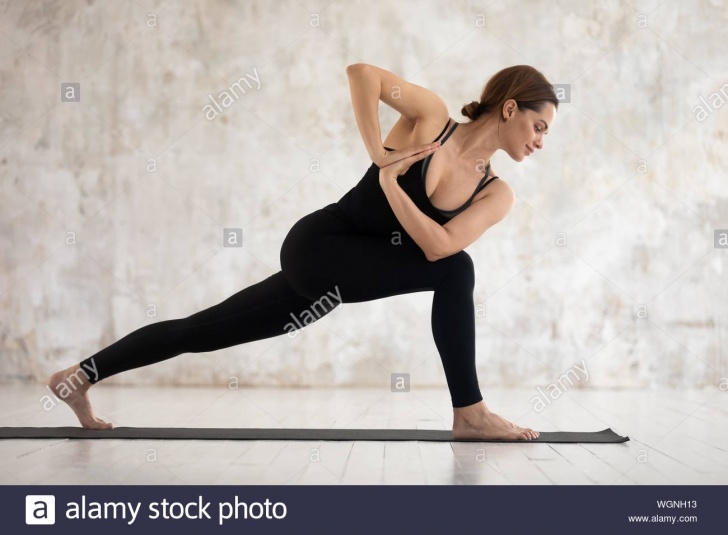easy yoga standing twist poses photo